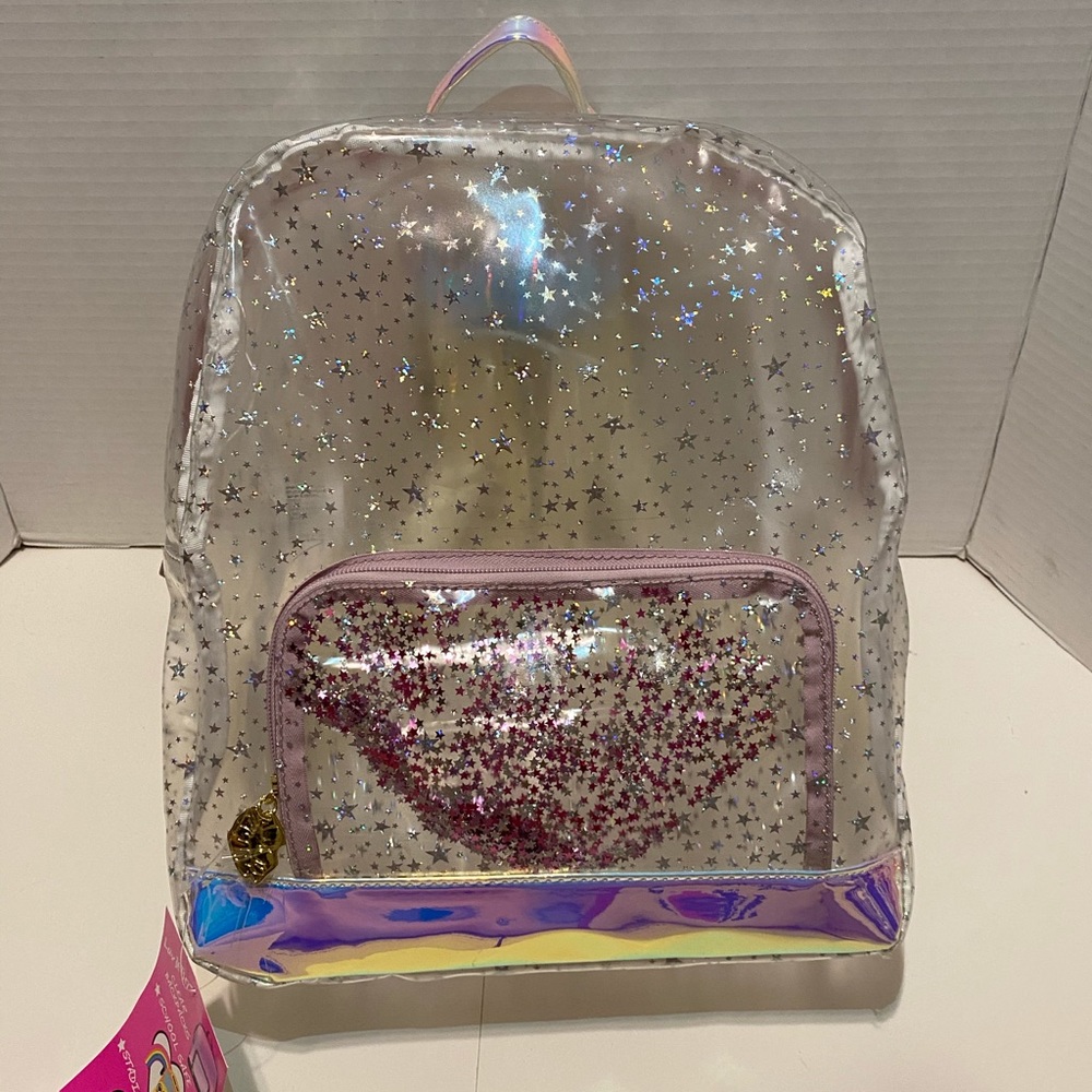 A clear backpack with silver stars on it.